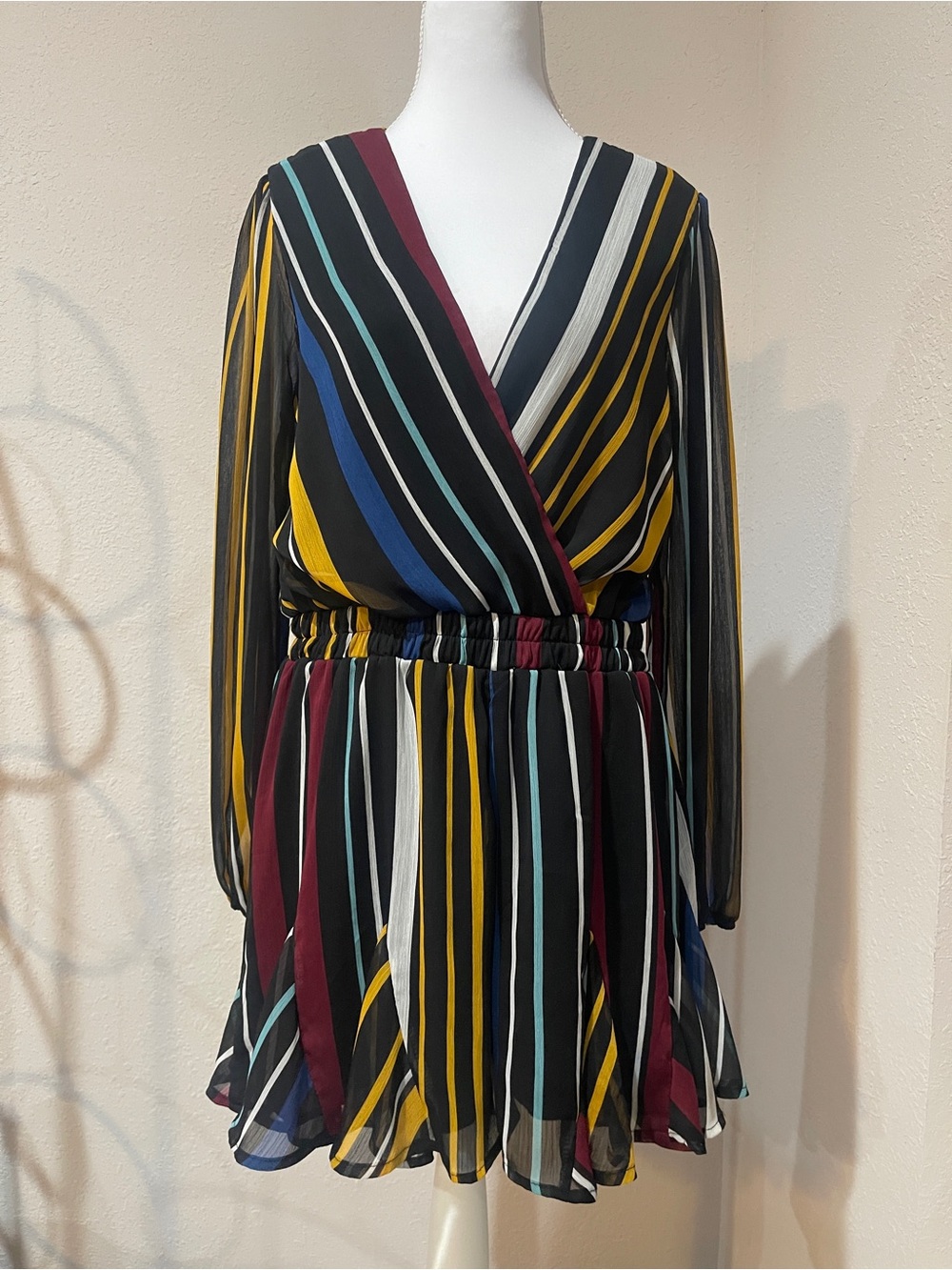 Striped V-Neck Long Sleeve Mini Romper in Black with Multi-Color Stripes Size L